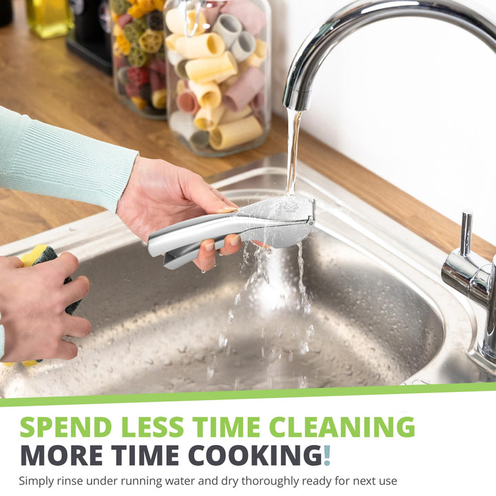 Easy clean garlic press rinsed under the kitchen tap - less time cleaning, more time cooking
