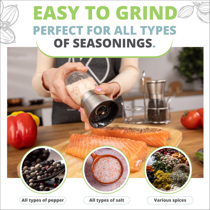 Seasoning salmon with the salt mill - for peppercorns, sea salt and dried seasonings