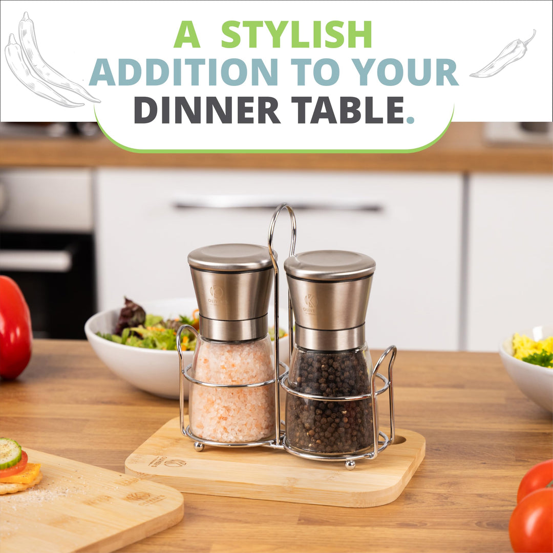 Oliver's Kitchen glass mill set on a wooden worktop next to a fresh salad